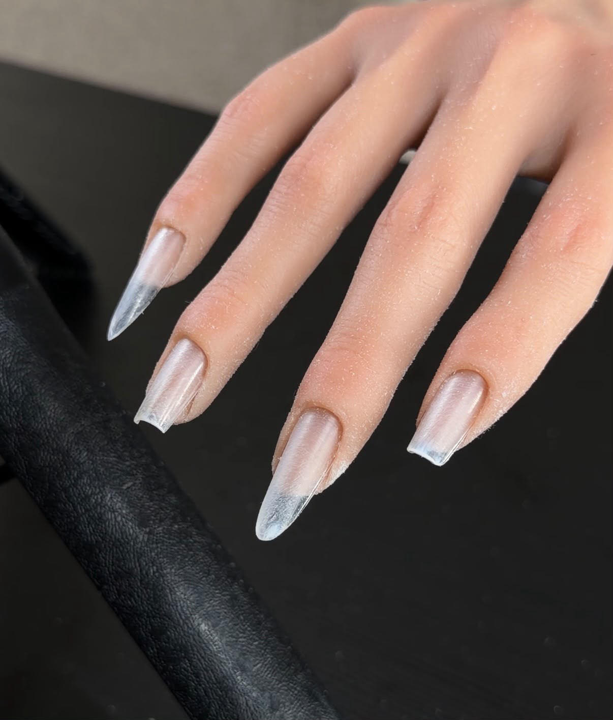 Long chrome-tip almond nails created in the shaping masterclass