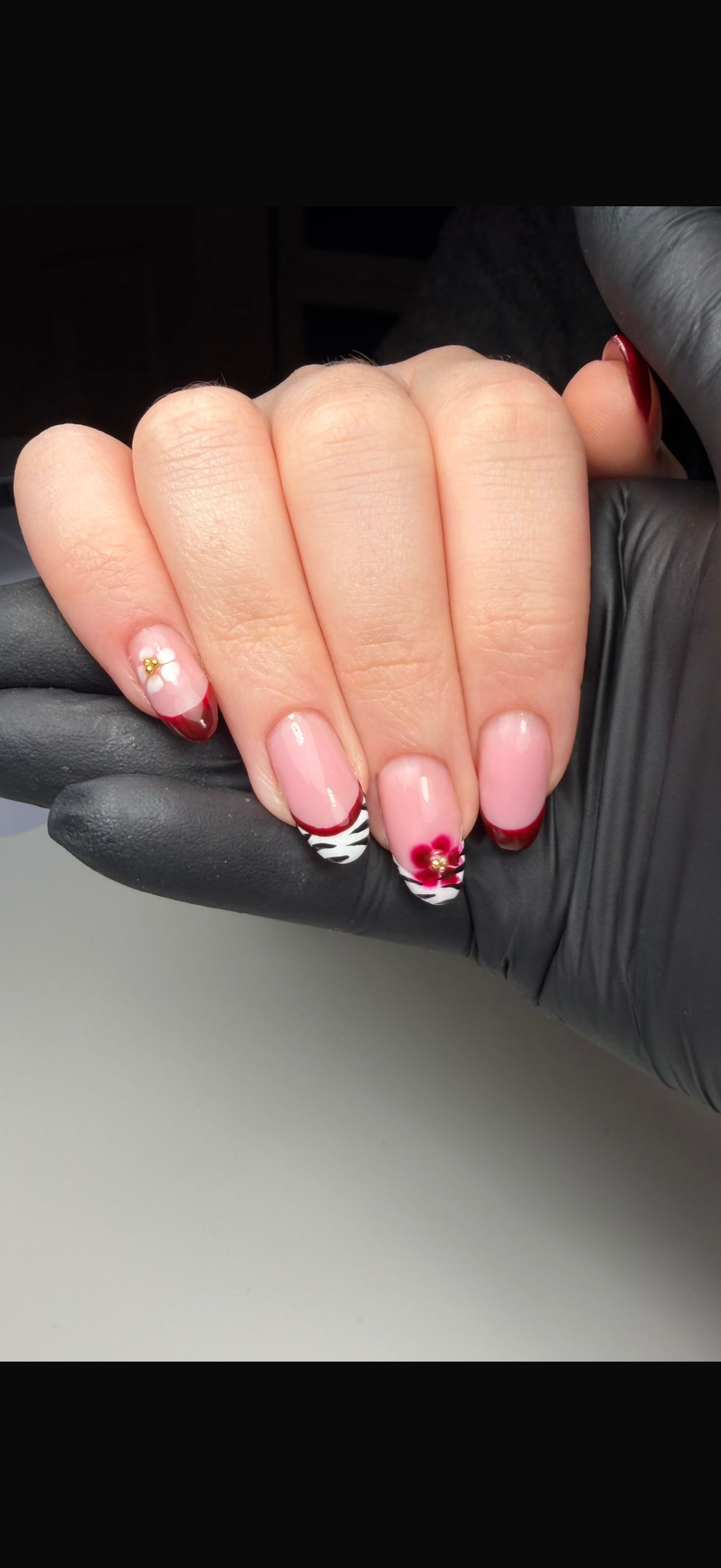 Red french nails with floral art